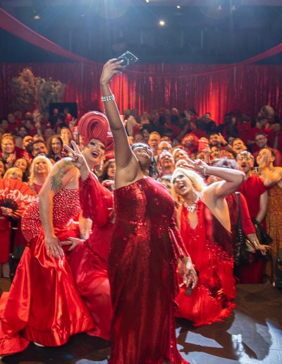 A crowd selfie at The Red Dress Ball in 2022